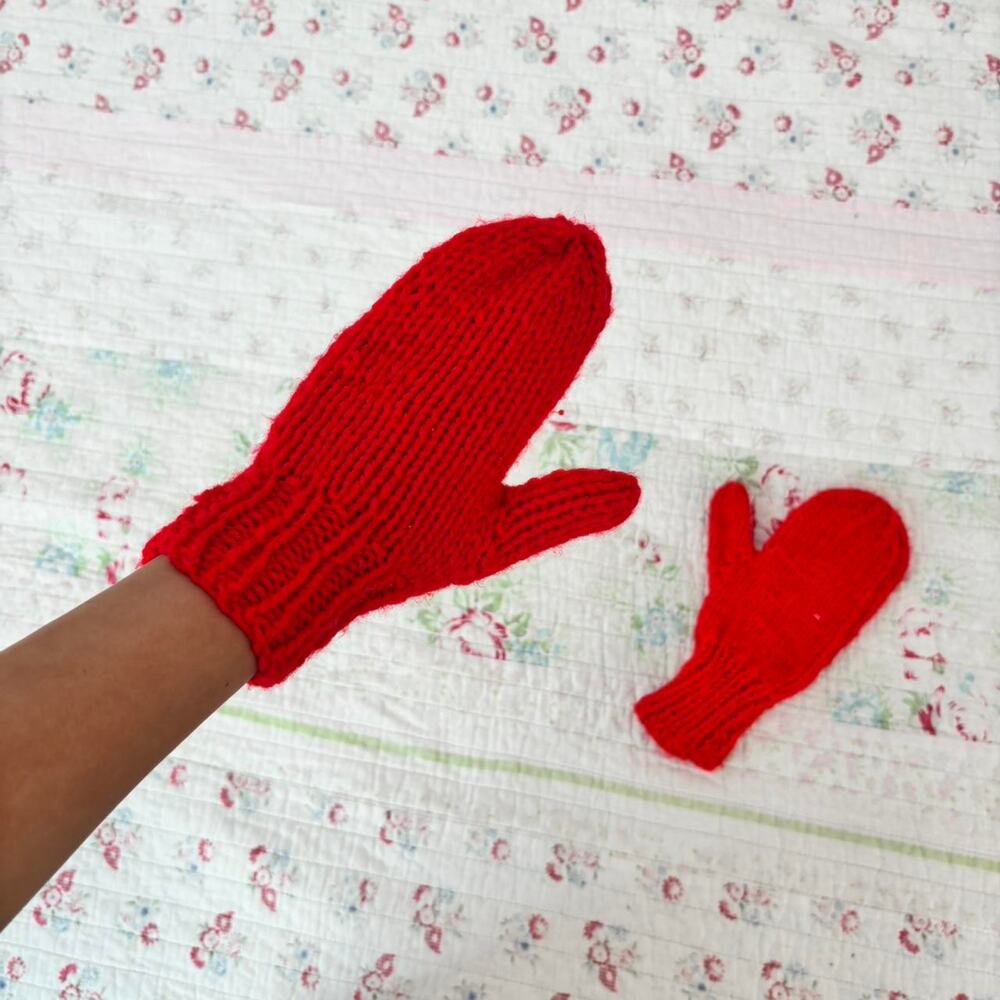 Bright red knit mittens